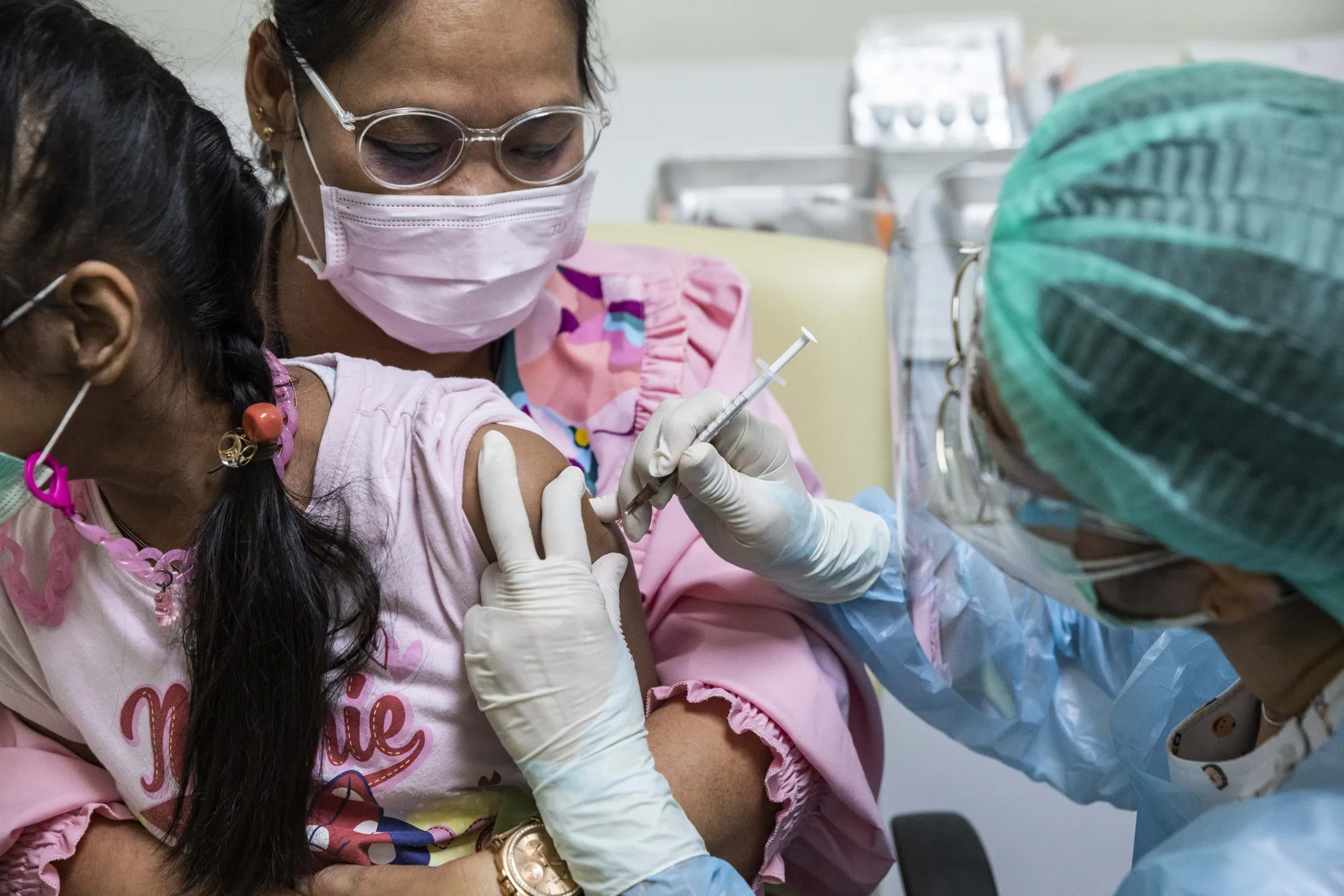 A child receives a dose of the Pfizer-BioNTech Covid-19 vaccine in Bangkok in June 2022. 