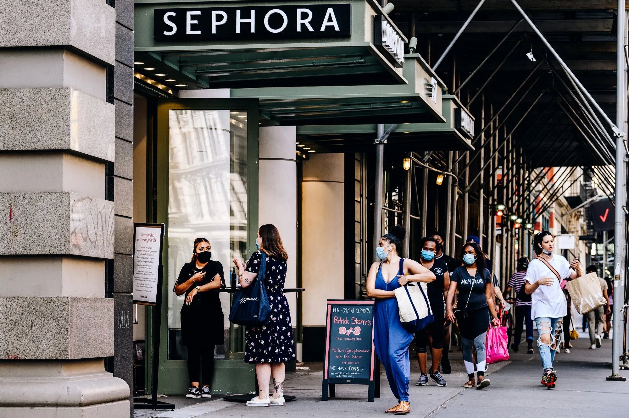 Pedestrians pass in front of a Sephora&nbsp;store in the Soho neighborhood of New York&nbsp;in August.&nbsp;