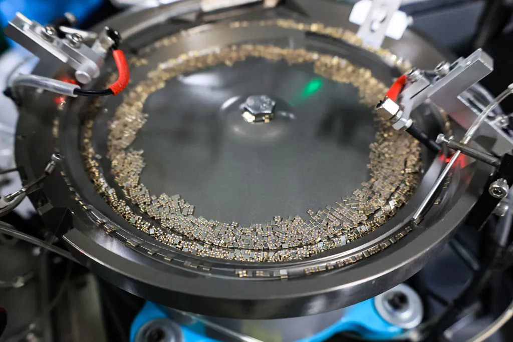 Quartz crystal electronic components on the production line, in Jinhua, Zhejiang Province of China.&nbsp;