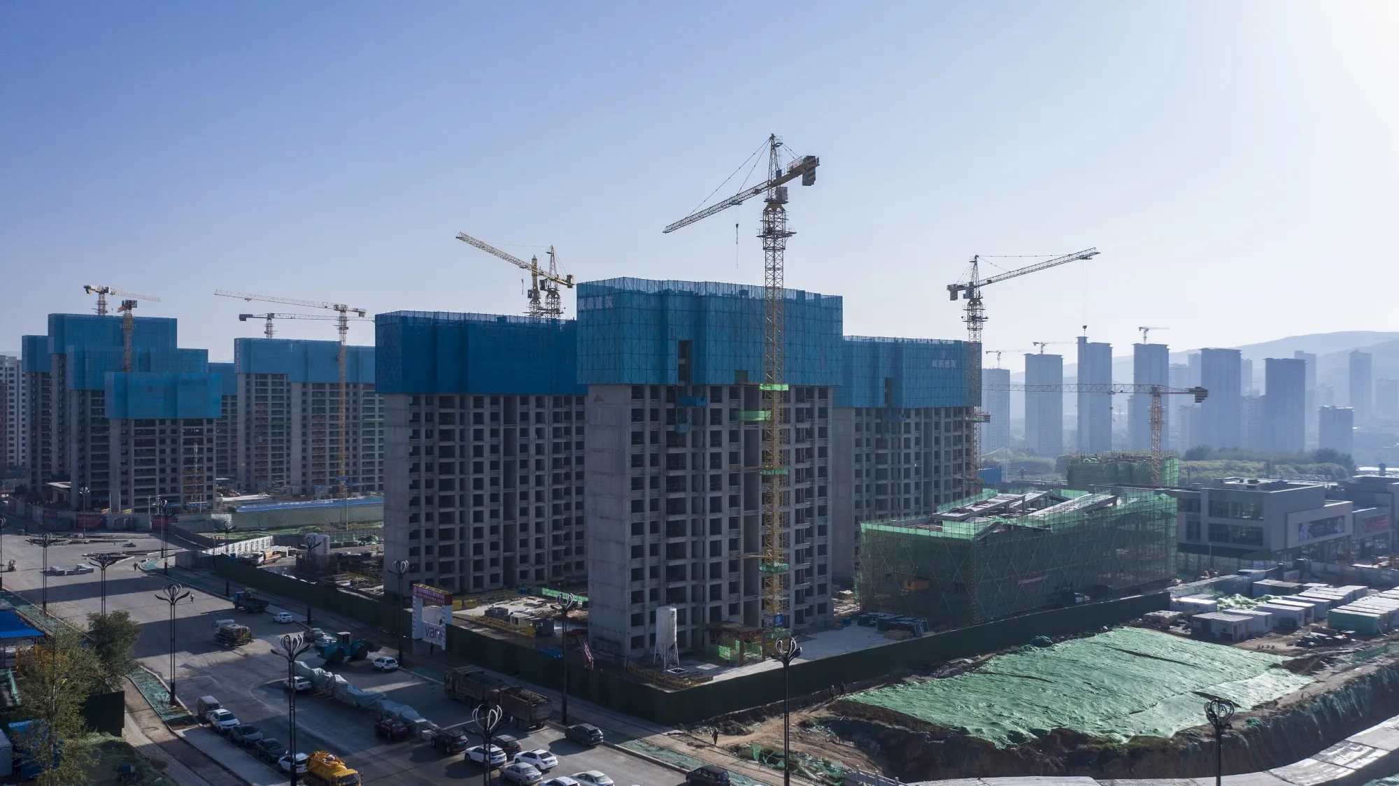 Apartment blocks under construction at a&nbsp;Vanke Co. residential development&nbsp;in Xining, Qinghai province, China.