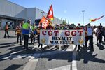 Workers and union members protest outside the Renault SA auto plant in Maubeuge, on May 30.