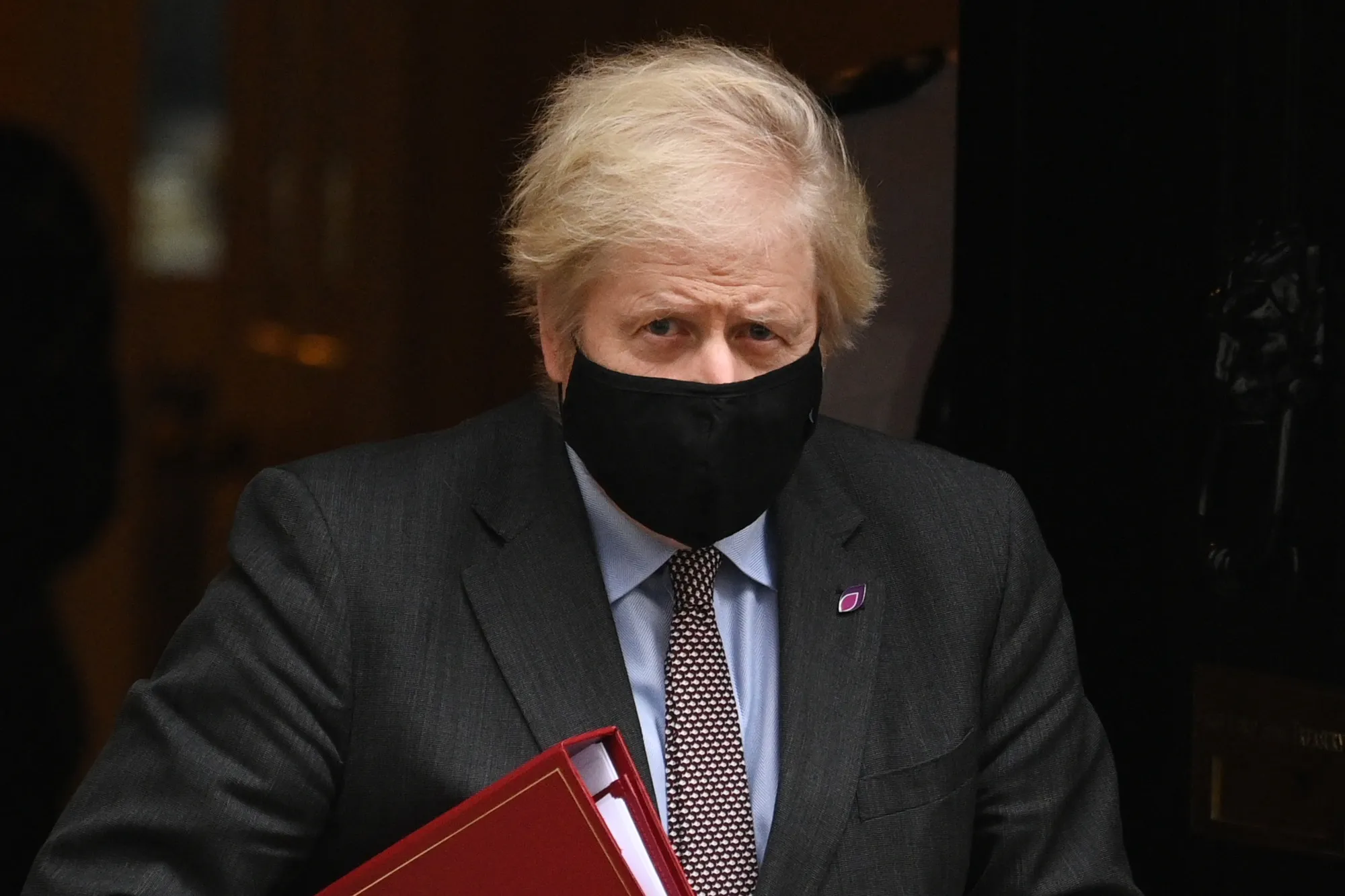 Boris Johnson leaves in London, Jan. 27.