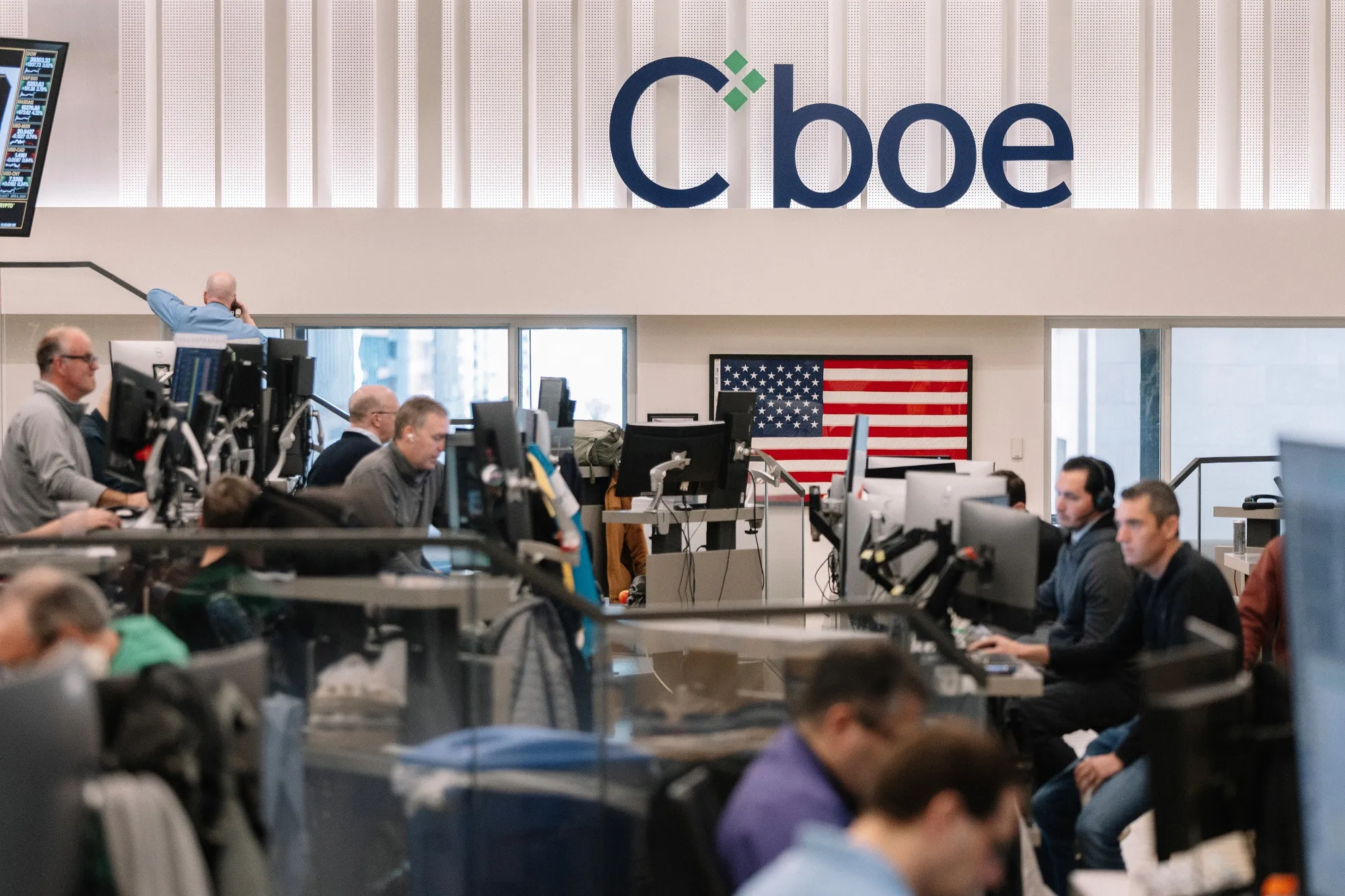 Traders work in the Cboe Volatility Index options pit at the Cboe Global Markets exchange in Chicago.
