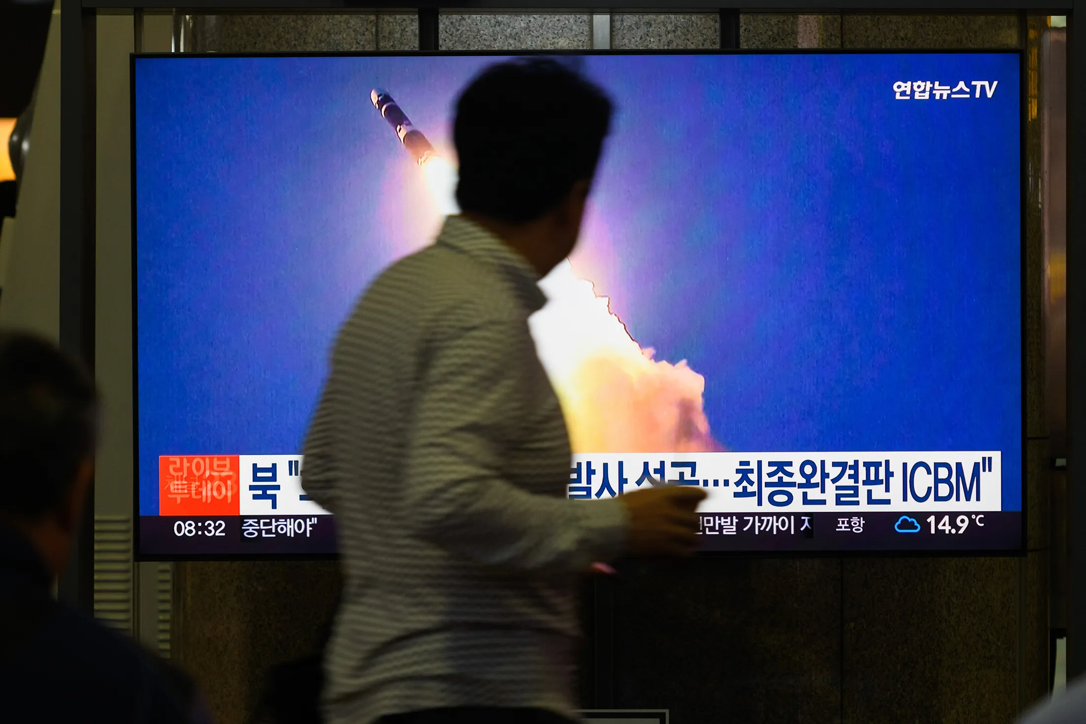 A monitor displays a test launch for a new intercontinental ballistic missile (ICBM)&nbsp;from an undisclosed place in North Korea, during a news broadcast&nbsp;in Seoul&nbsp;on Nov. 1.