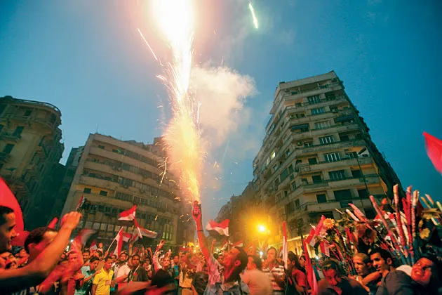 Egyptians in Tahrir Square celebrate Mursi's election