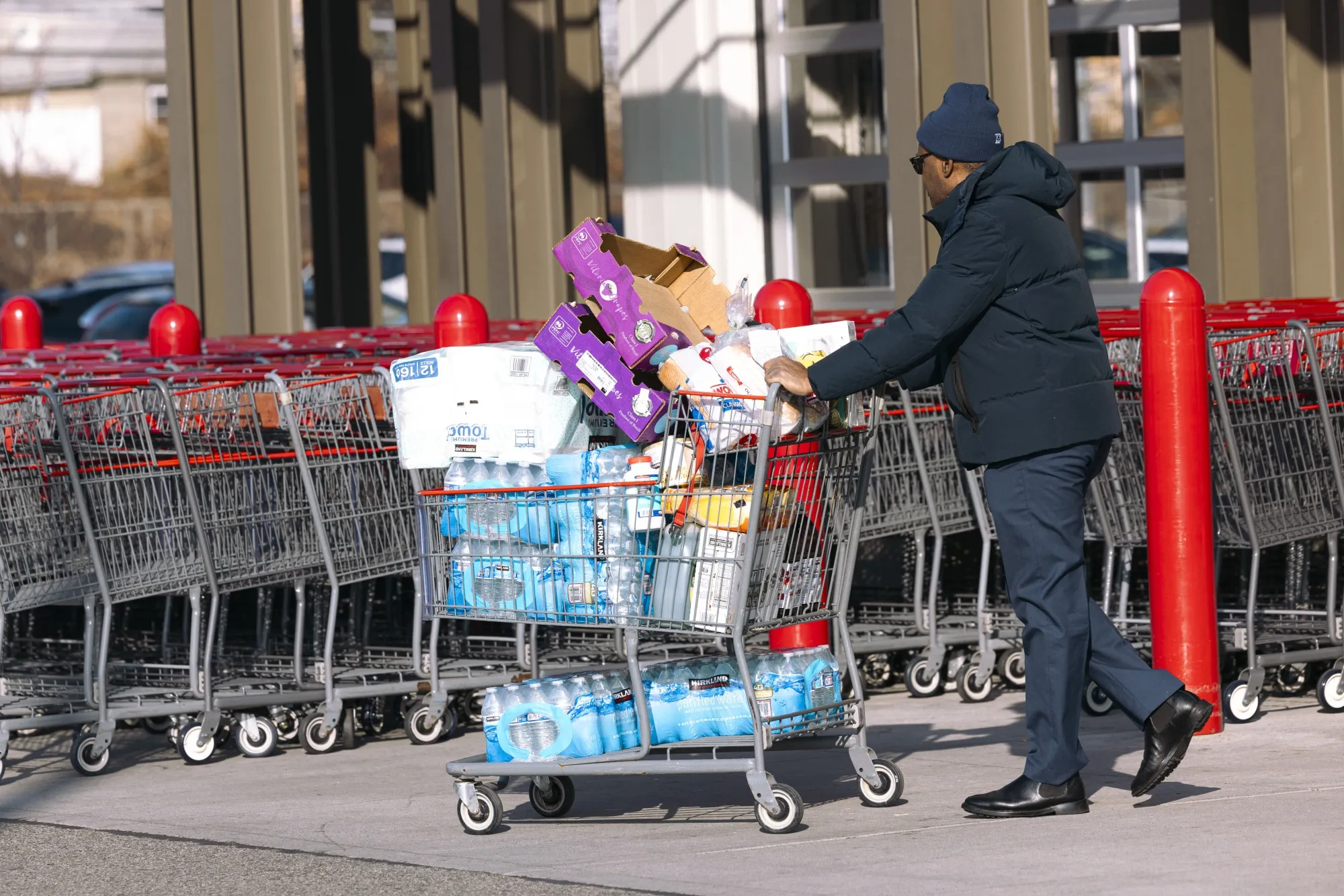 A shopper outside a wholesale&nbsp;store in Bayonne, New Jersey.