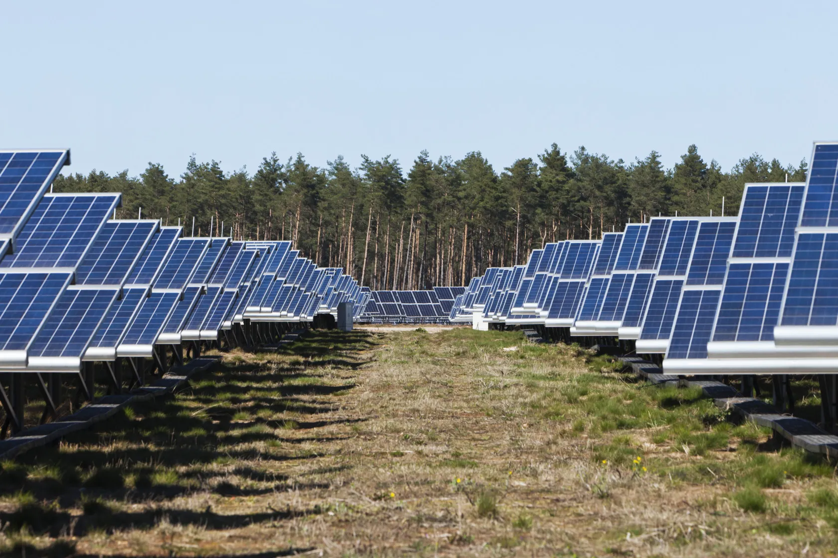 Solar panels stand on a large scale photovoltaic power plant in Marienfliess, near Berlin, Germany.