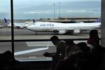 A United Airlines Boeing 747 aircraft taxis to the runway at San Francisco International Airport, on Jan. 11, 2014.