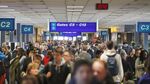 Traveler make their way to gates at Salt Lake City International Airport in Salt Lake City on Friday, Dec. 23, 2016.

