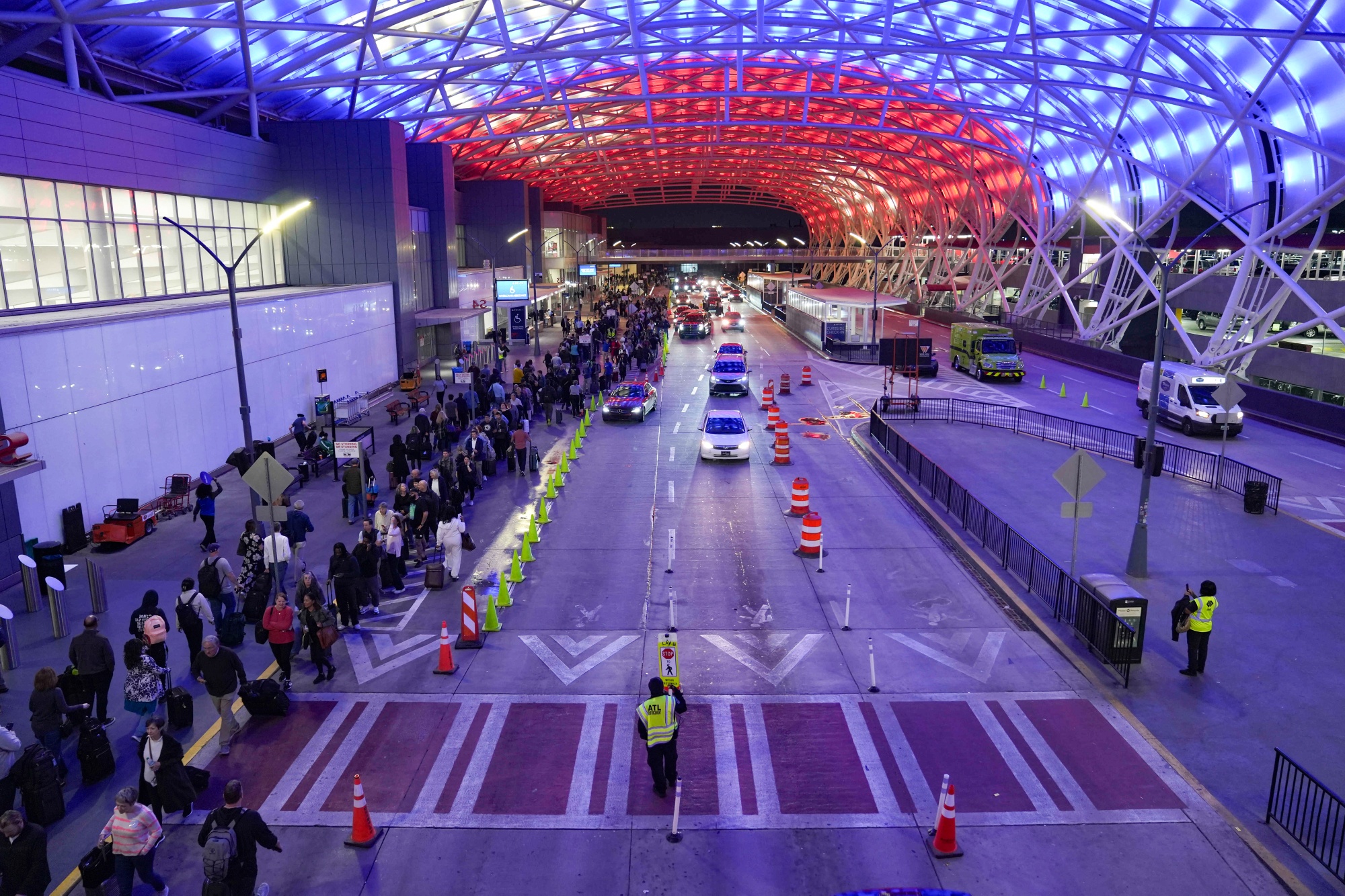 Travelers wait in line for a TSA checkpoint at Atlanta Hartsfield-Jackson International Airport in Atlanta on March 26. Photographer: Megan Varner/Getty Images