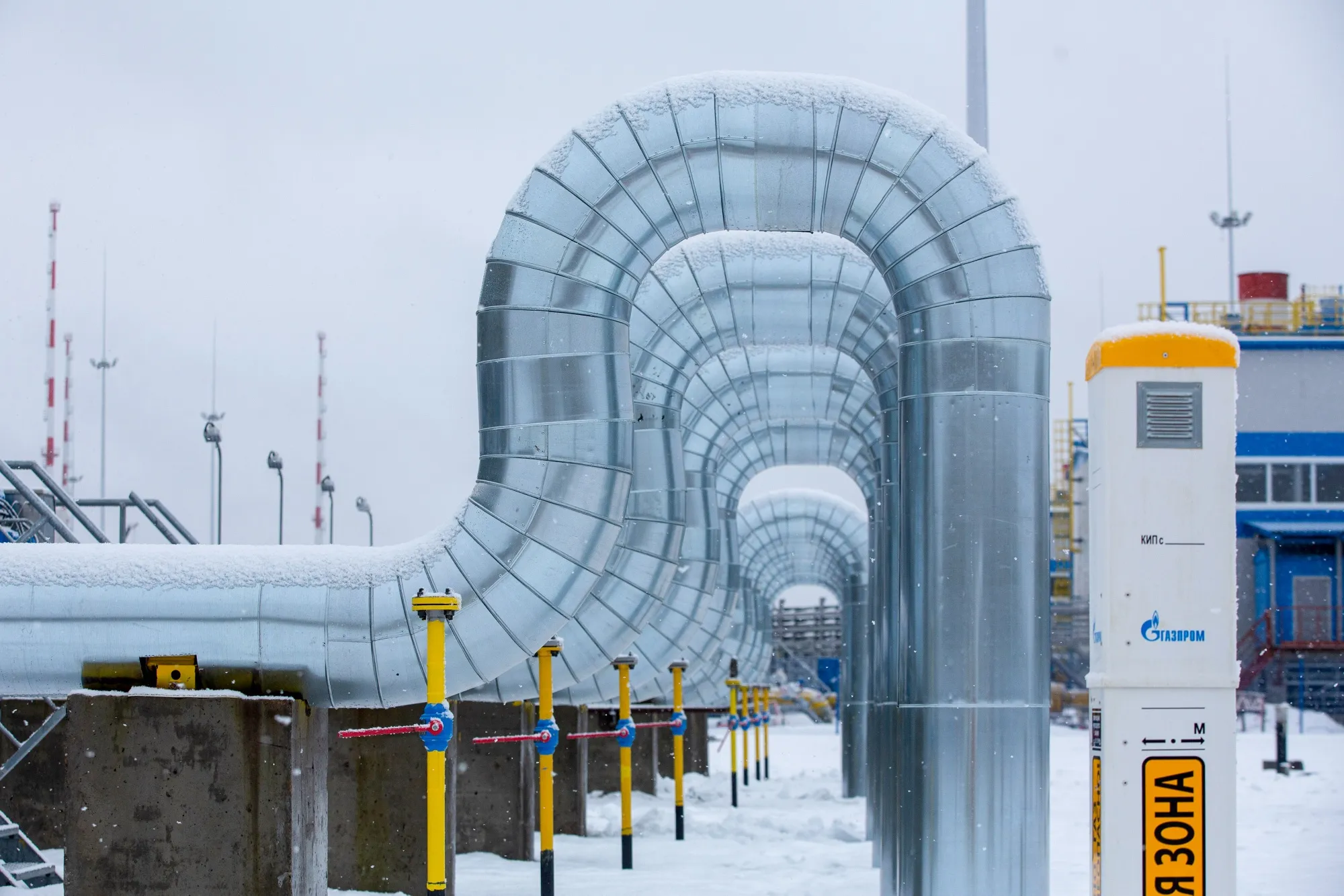 A branded marker post alongside pipework at Gazprom’s Slavyanskaya compressor station, the starting point of the Nord Stream 2 gas pipeline, in Ust-Luga, Russia, on Jan. 28.