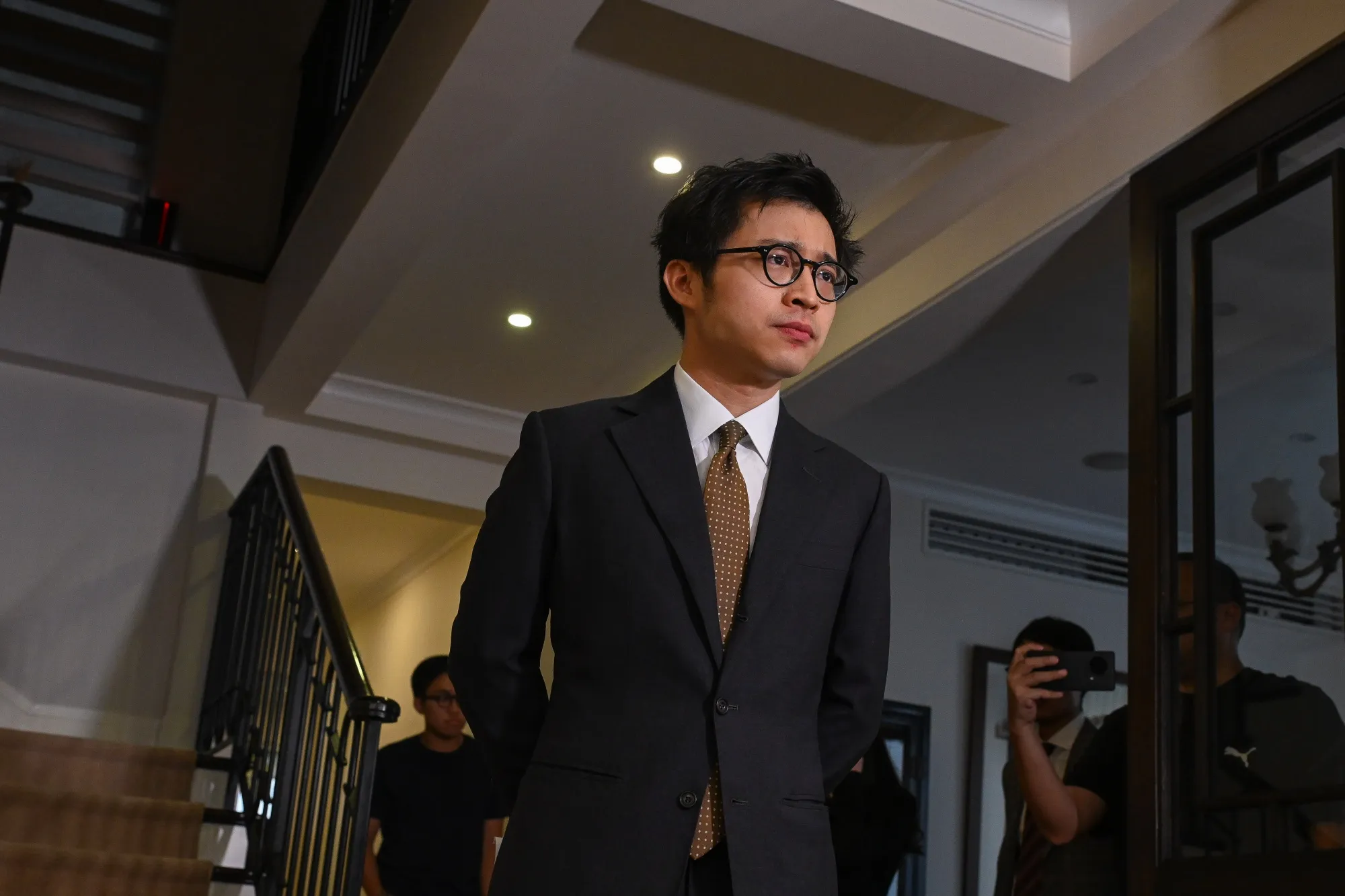 個人投資家の仮想通貨取引、是か非か－香港の逮捕劇で論争再び - Bloomberg