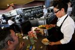 relates to What’s at Stake in Washington’s Heated Battle Over Tipped Workers