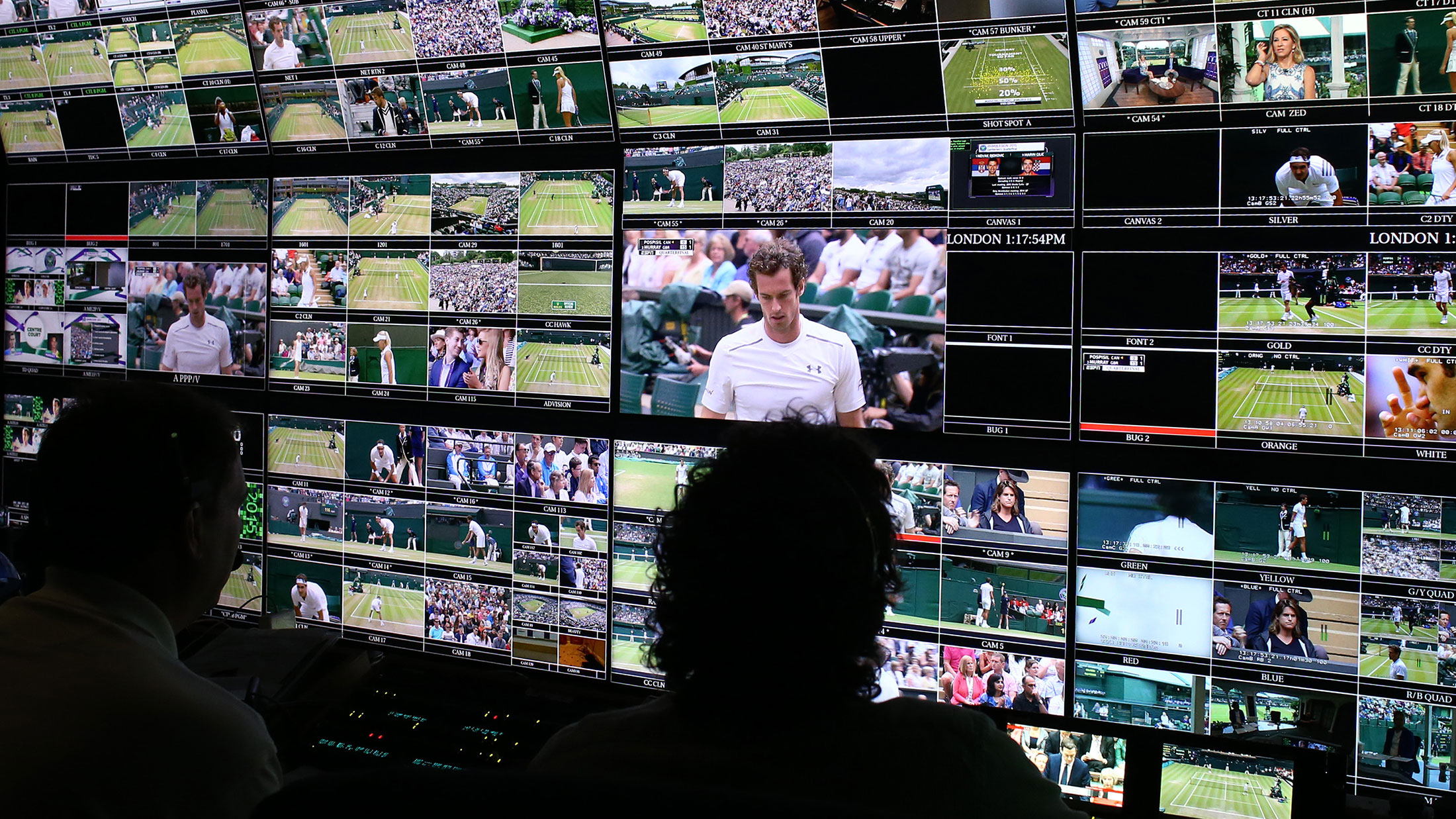 Production staff view screens in an ESPN operation room on day 9 of the Wimbledon Lawn Tennis Championships at the All England Lawn Tennis and Croquet Club on July 8, 2015 in London.
