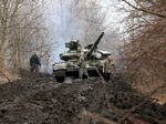Ukrainian servicemen work on a tank in Lysychansk, Eastern Ukraine, on April 7.&nbsp;