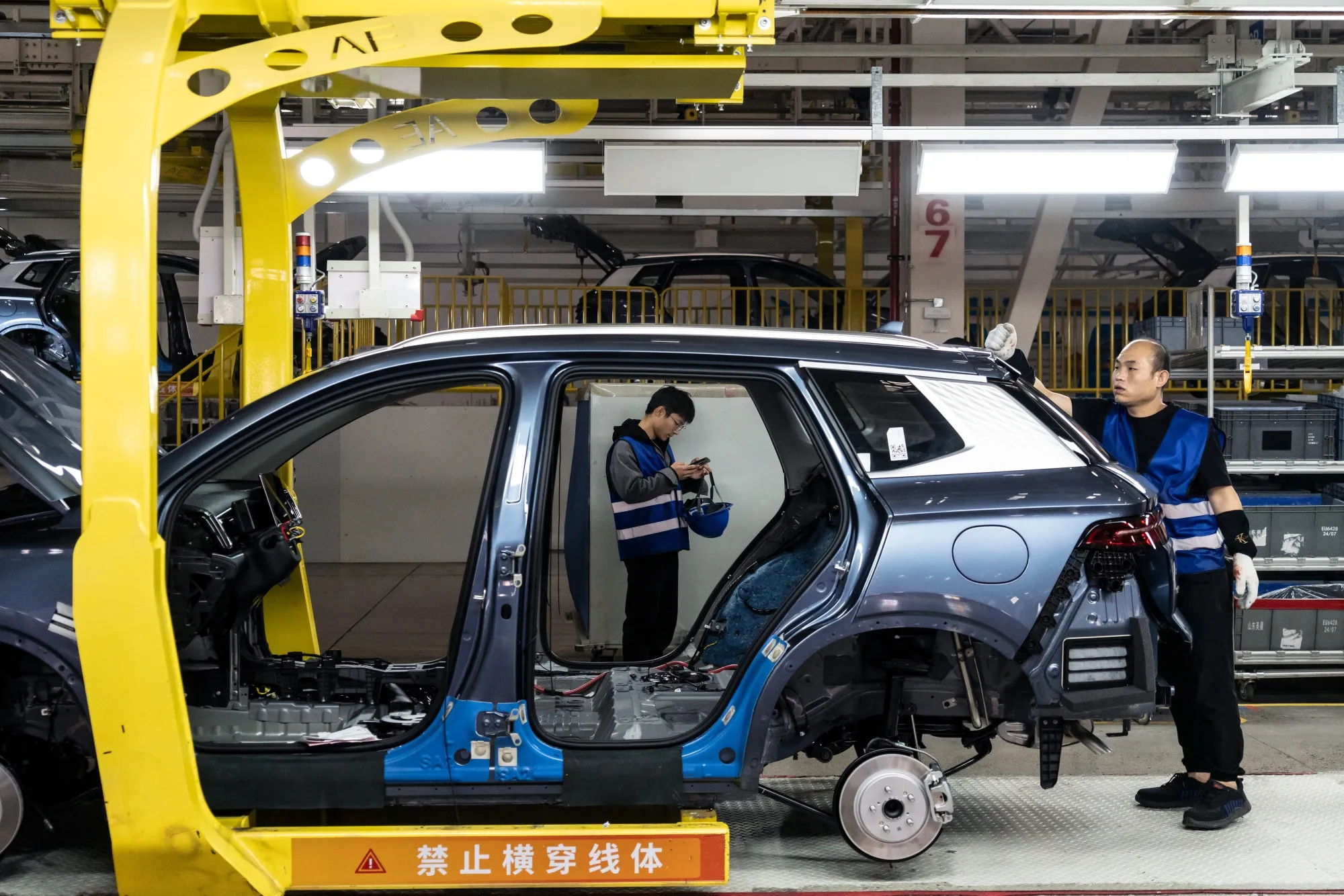 Workers at a BYD Co. factory in Zhengzhou, China.