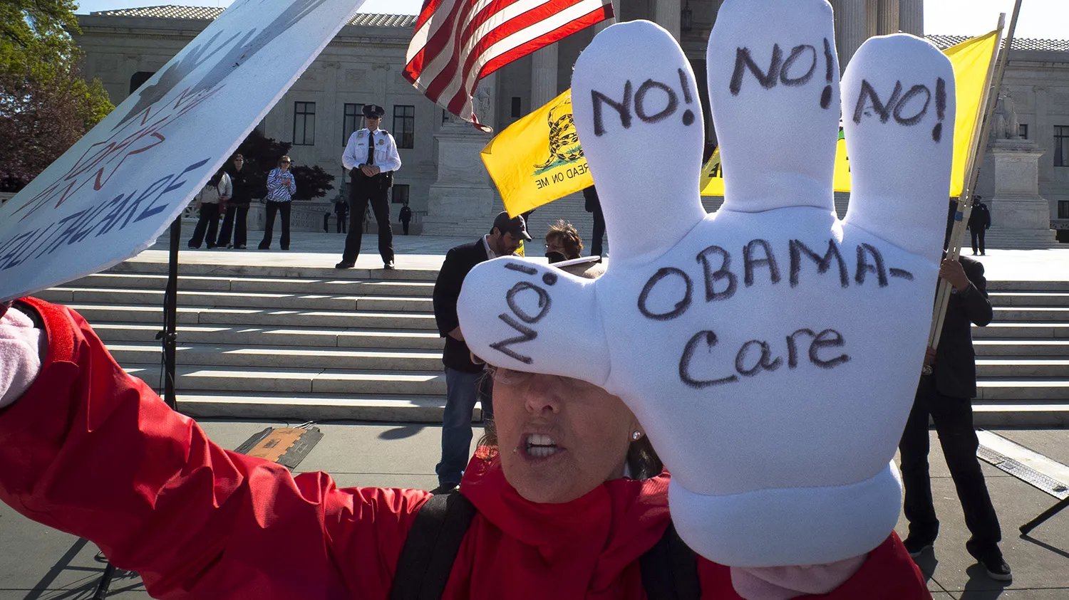A Tea-Party supporter protest outside the US Supreme Court on the third day of oral arguements over the constitutionality of the Patient Protection and Affordable Care Act on March 28, 2012 in Washington, DC. The 26 states challenging the law argue that Affordable Care Act must be completely repealed if the requirement that all Americans buy health insurance -- known as the "individual mandate" -- is found to be unconstitutional. AFP PHOTO/MLADEN ANTONOV (Photo credit should read MLADEN ANTONOV/AFP/Getty Images)
