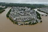 Heavy Flooding, Landslides Destroy Buildings, Roads in China
