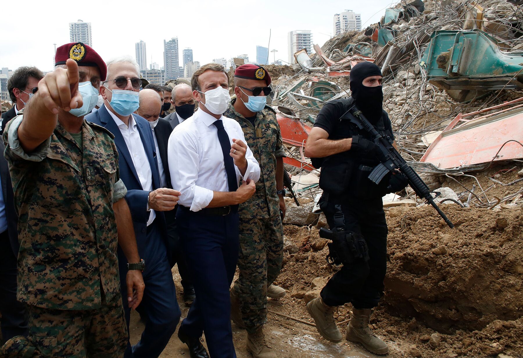 Emmanuel Macron visits the site of the explosion at the Port of Beirut, on Aug. 6.