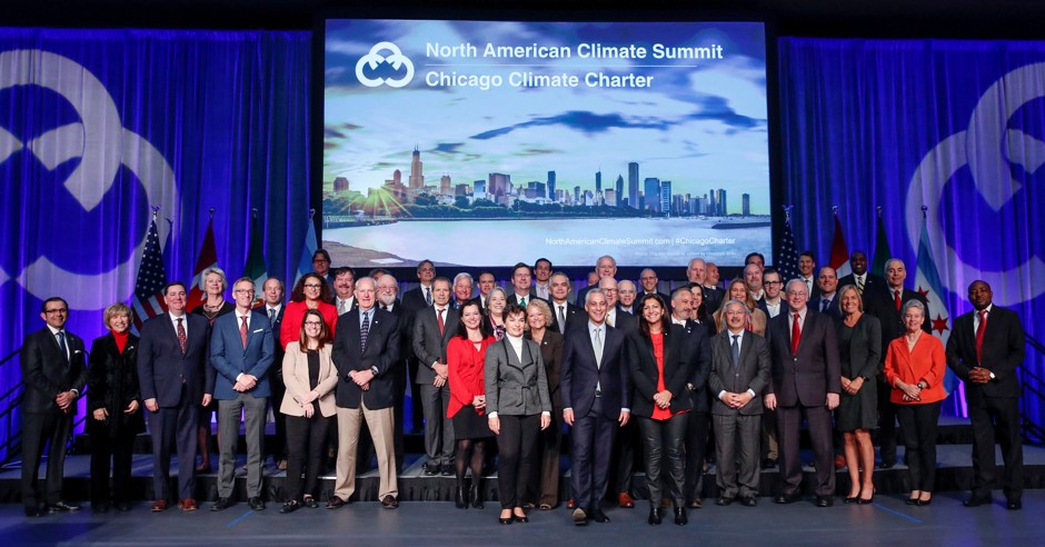 World mayors pose for a group picture after signing the Chicago Climate Charter during the North American Climate Summit in Chicago, Illinois, December 5, 2017.