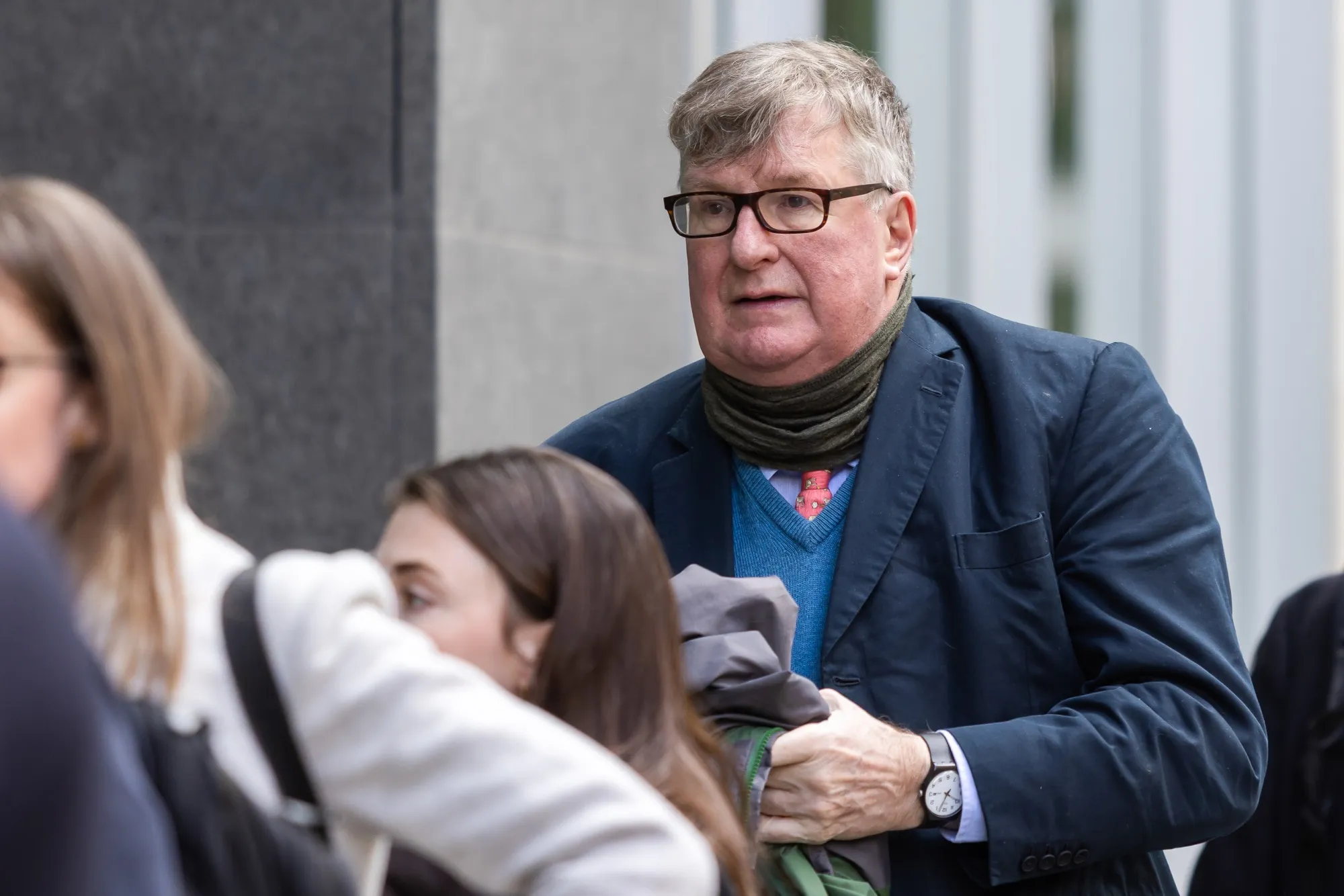 Crispin Odey arrives at The Rolls Building in London on March 11.