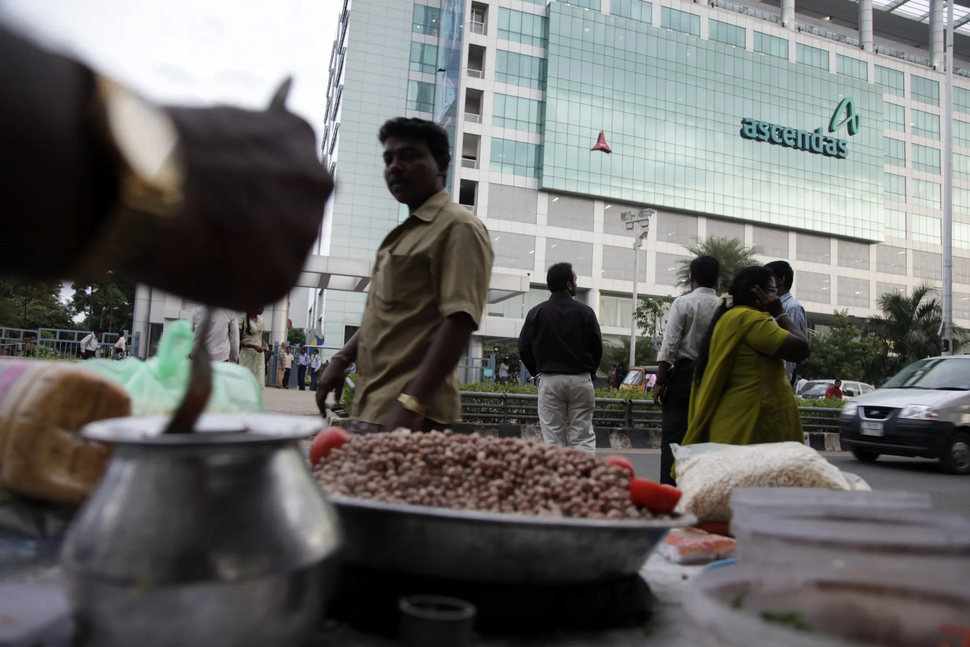 Workers and vendors gather in front of International Tech Park in&nbsp;Chennai.