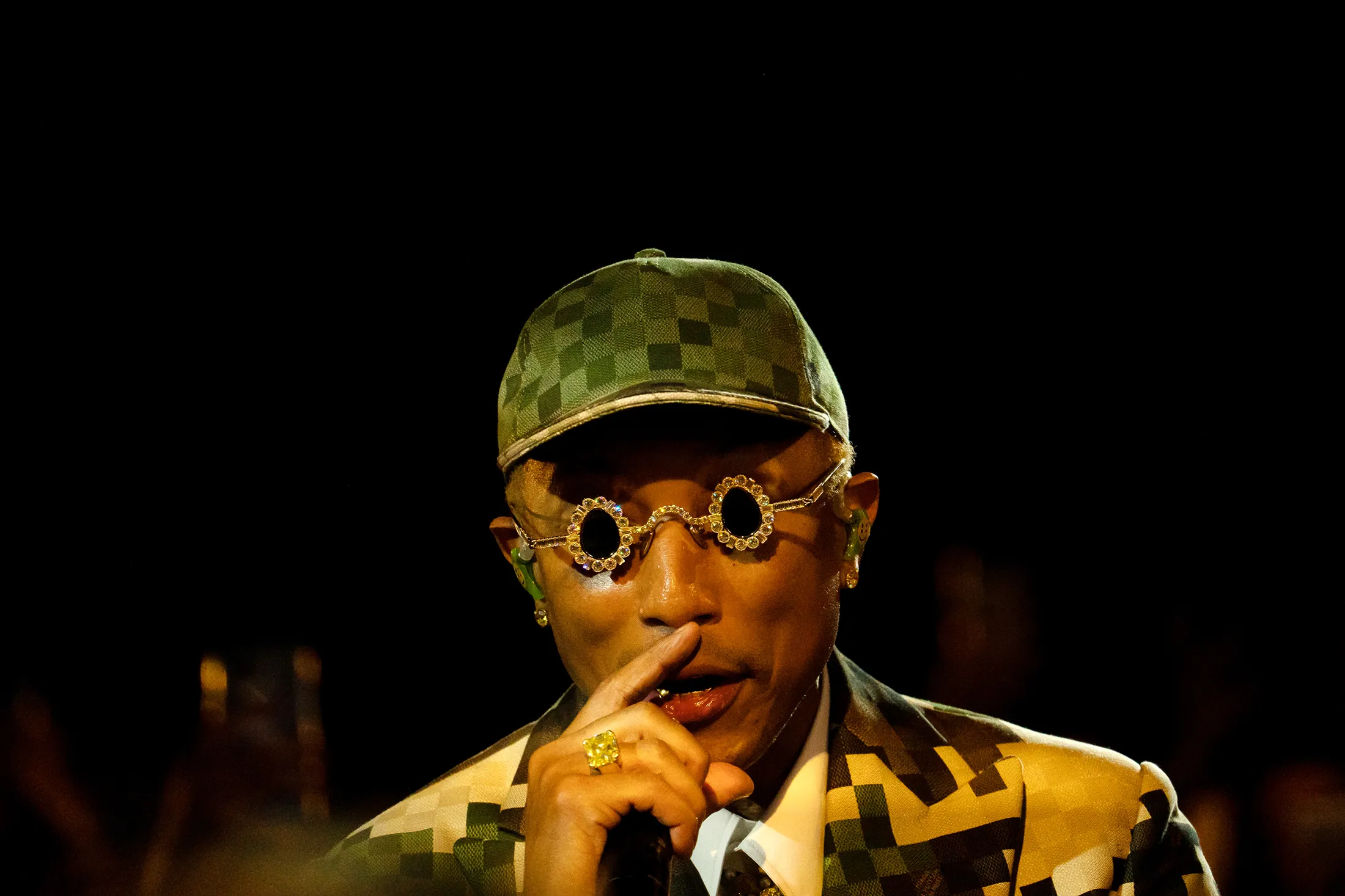Pharrell Williams performs after unveiling his Louis Vuitton Spring-Summer 2024 menswear collection on Paris’ Pont Neuf.