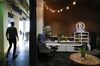 A Bitcoin neon sign is displayed in a lounge area at the Coinbase Inc. office in San Francisco.