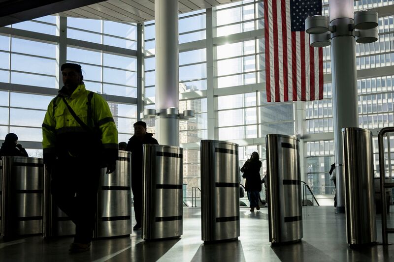 Commuters at the Staten Island Ferry Terminal in New York, US, on Friday, Feb. 7, 2025.