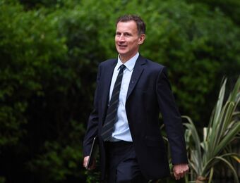 relates to Hunt Vows to Fight for Seat in UK Elections Despite Tory Exodus