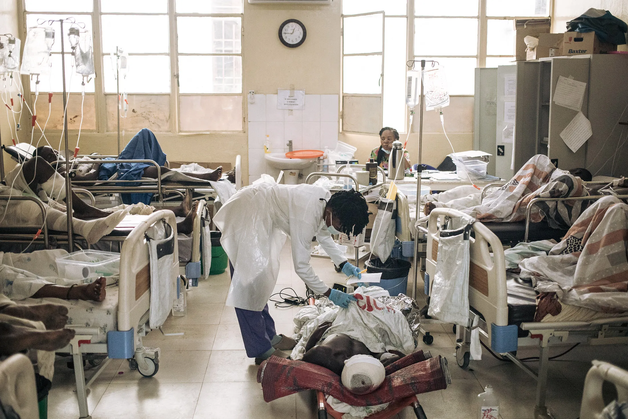 &nbsp;A health professional attends to a wounded man from the recent clashes at Ndosho hospital in Goma, Democratic Republic of Congo,&nbsp;on Jan.&nbsp;30.
