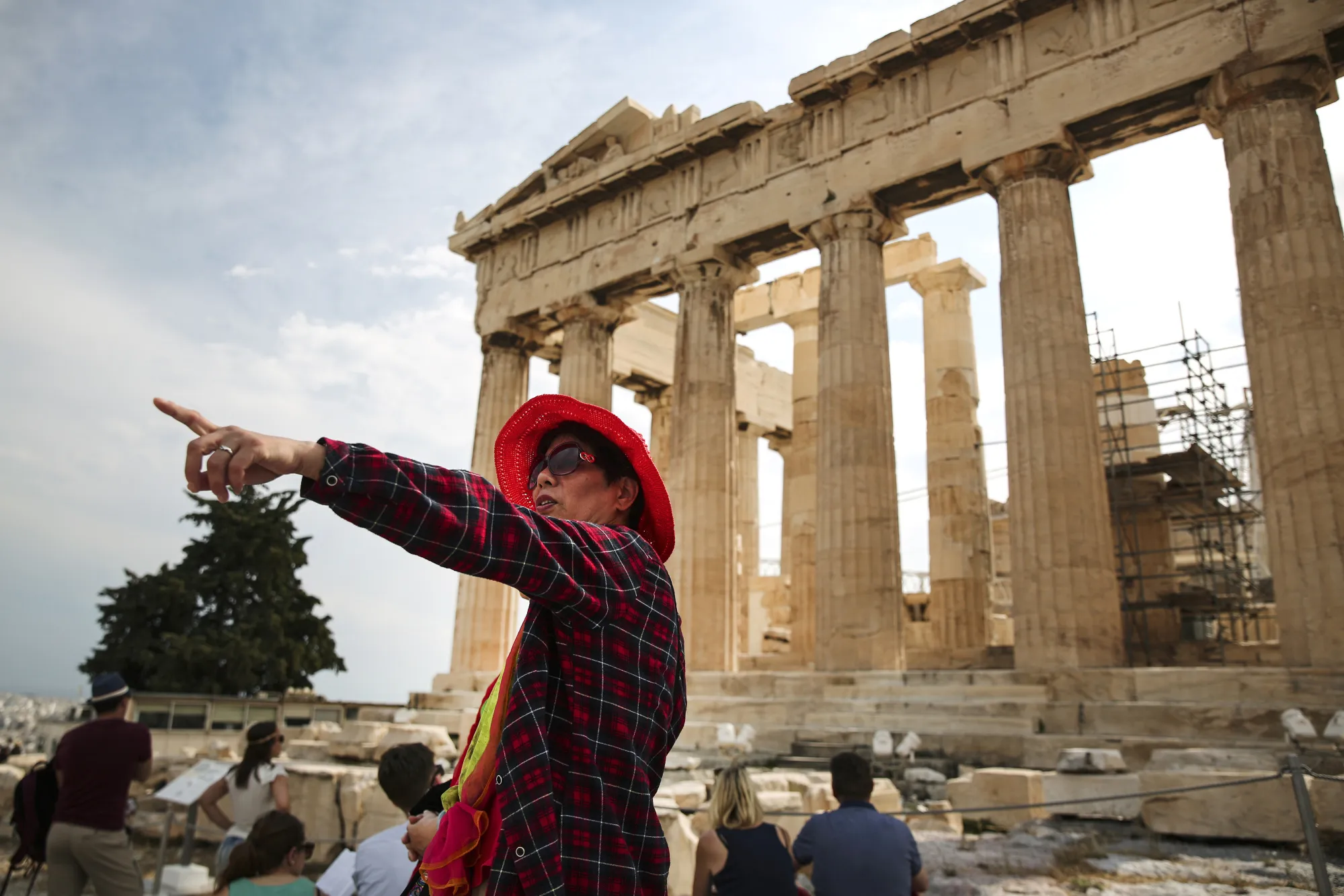 A Chinese tourist at the Parthenon in Athens.
