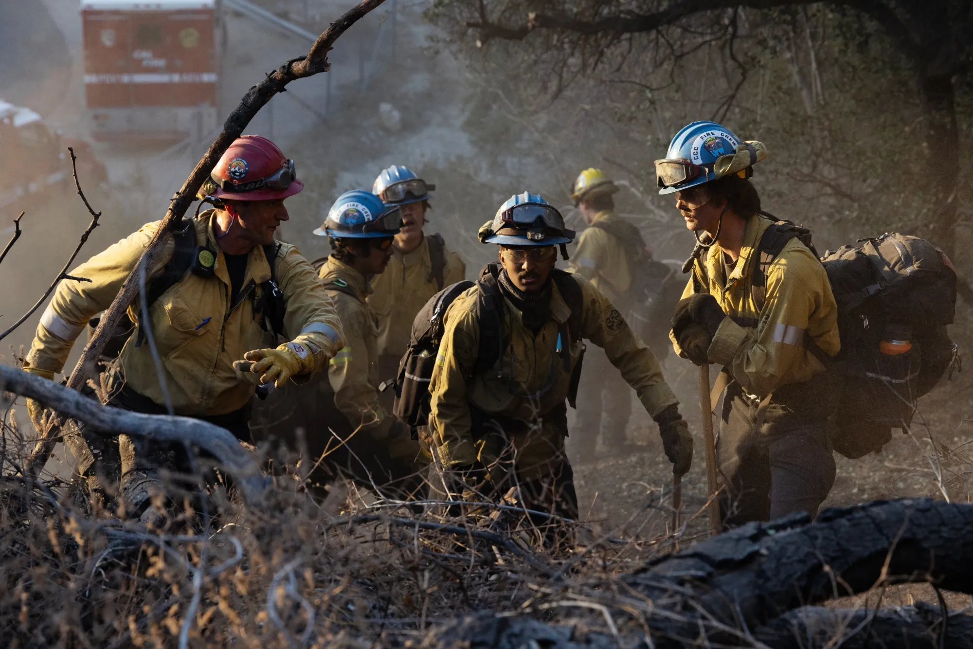 Firefighters from the California Conservation Corps work to contain the Eaton Fire in Altadena on Jan. 13.