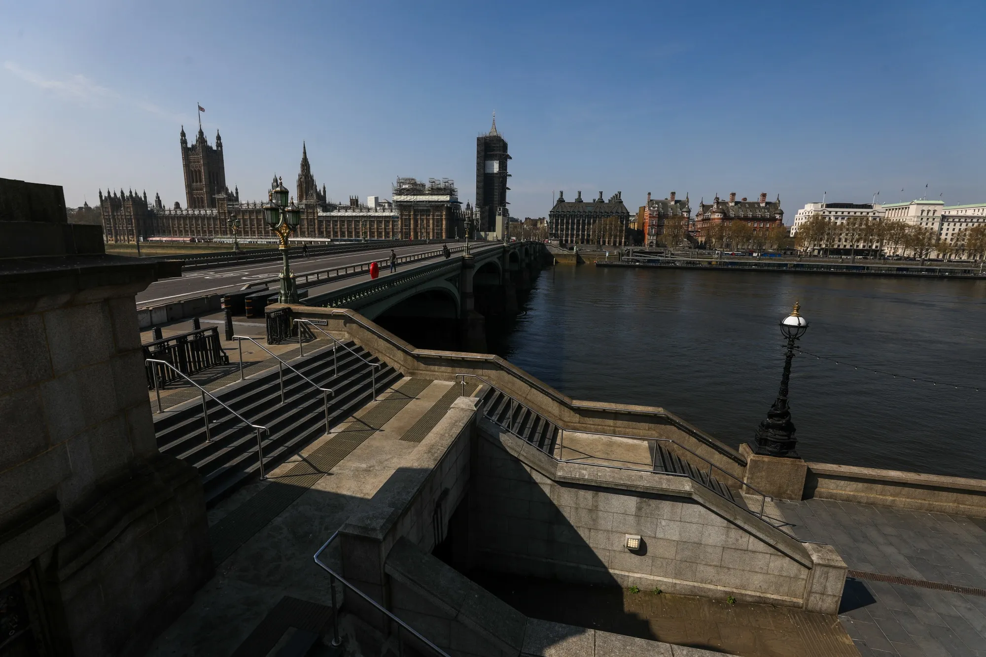 The Houses of Parliament stand&nbsp;across the River Thames in London on April 9.