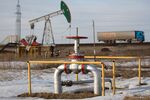 An oil pumping jack in an oilfield near Almetyevsk, Tatarstan, Russia.