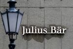 A corporate logo outside a Julius Baer Group Ltd. branch in Zurich, Switzerland, on Tuesday, July 13, 2021. UBS Group AG and Julius Baer report earnings this week. Photographer: Stefan Wermuth/Bloomberg