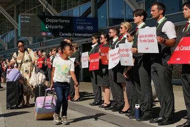 Air Canada flight attendants protest at Vancouver International Airport on Aug. 11.