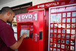 Efren Enriquez rents a DVD at a Redbox kiosk outside a 7-Eleven store in the Silver Lake area of Los Angeles
