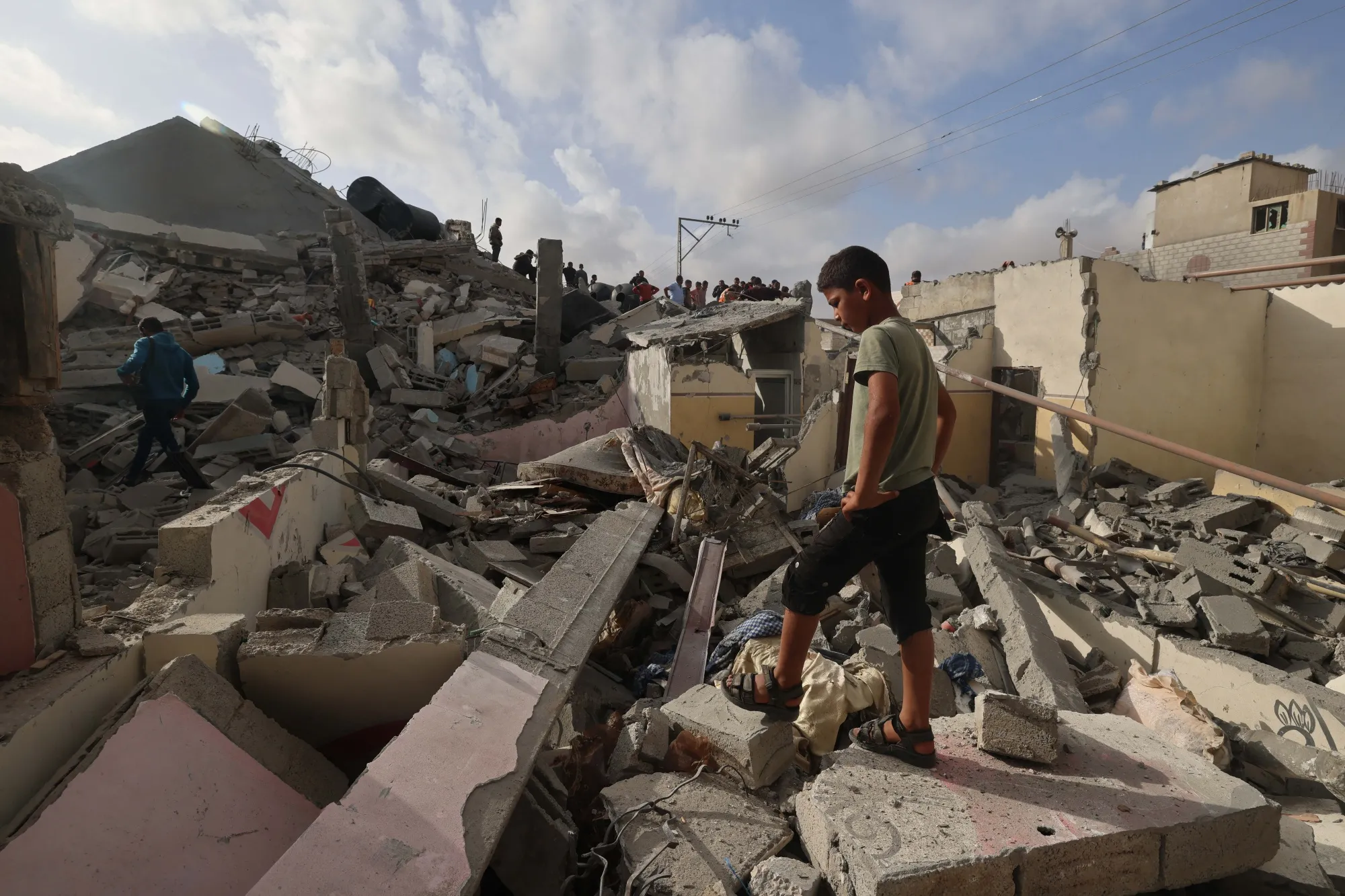 The rubble of a building hit in an overnight Israeli bombing in Rafah on April 21.