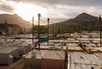 Power lines in the Imizamo Yethu informal settlement in the Hout Bay district of Cape Town, South Africa.