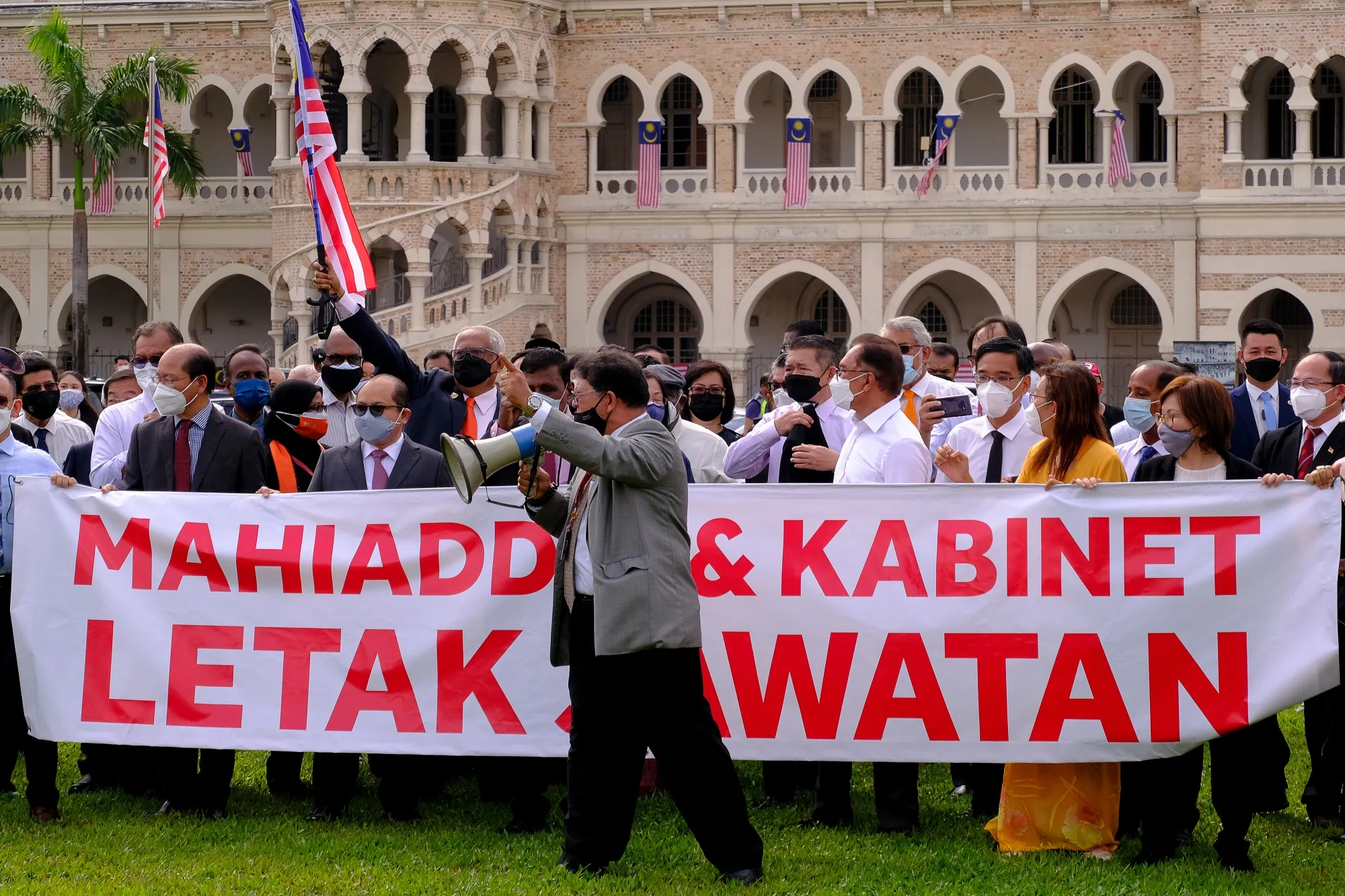 Malaysian opposition lawmakers demand Prime Minister Muhyiddin Yassin's resignation.