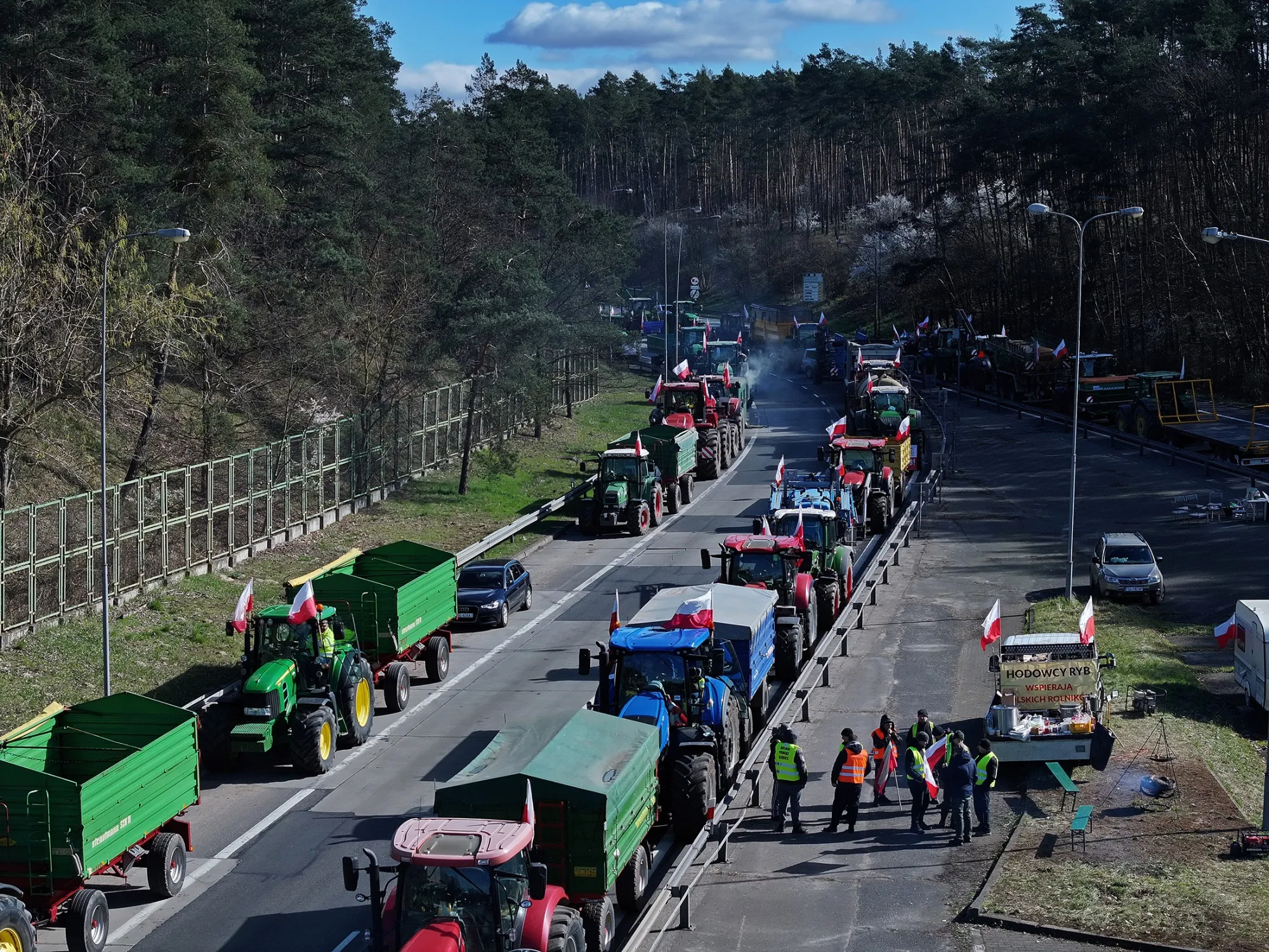 Farmers with their tractors block the A12 highway border crossing to Germany, near Slubice, Poland, on March 18.&nbsp;