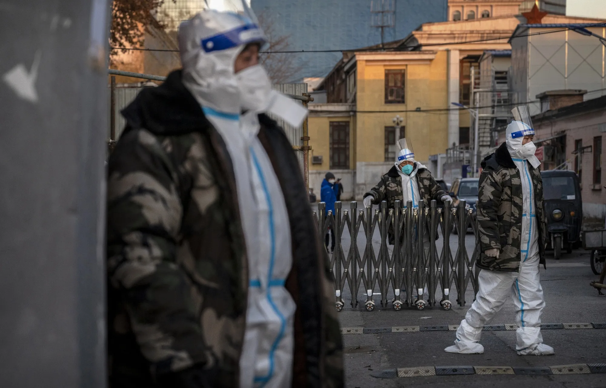 Security guards outside a community&nbsp;under health monitoring in Beijing on Dec.&nbsp;4.