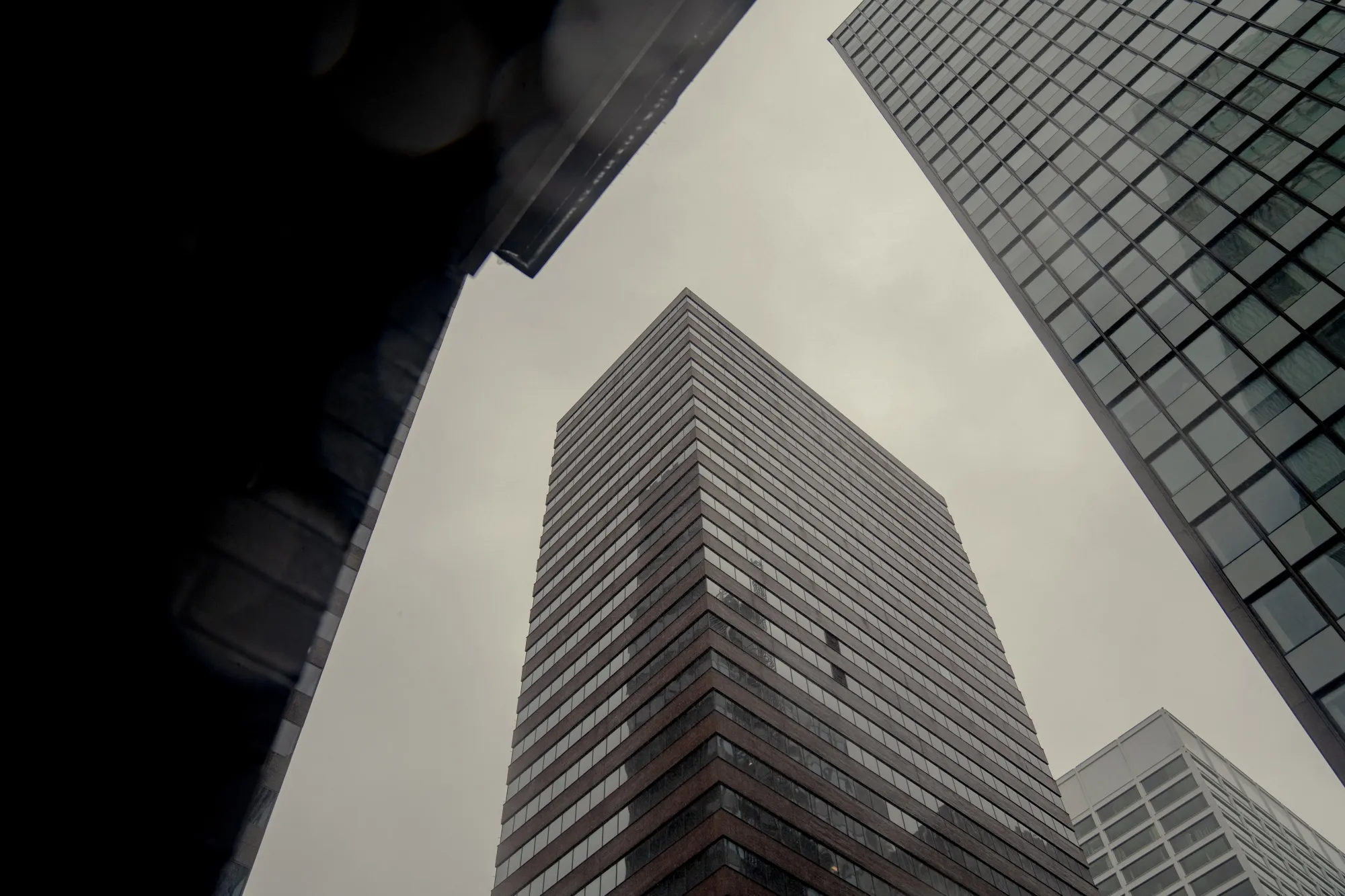 An entity co-founded by the son of a Quebec businessman bought AIG’s former headquarters&nbsp;at a 7% discount from the previous sale price in 2019.