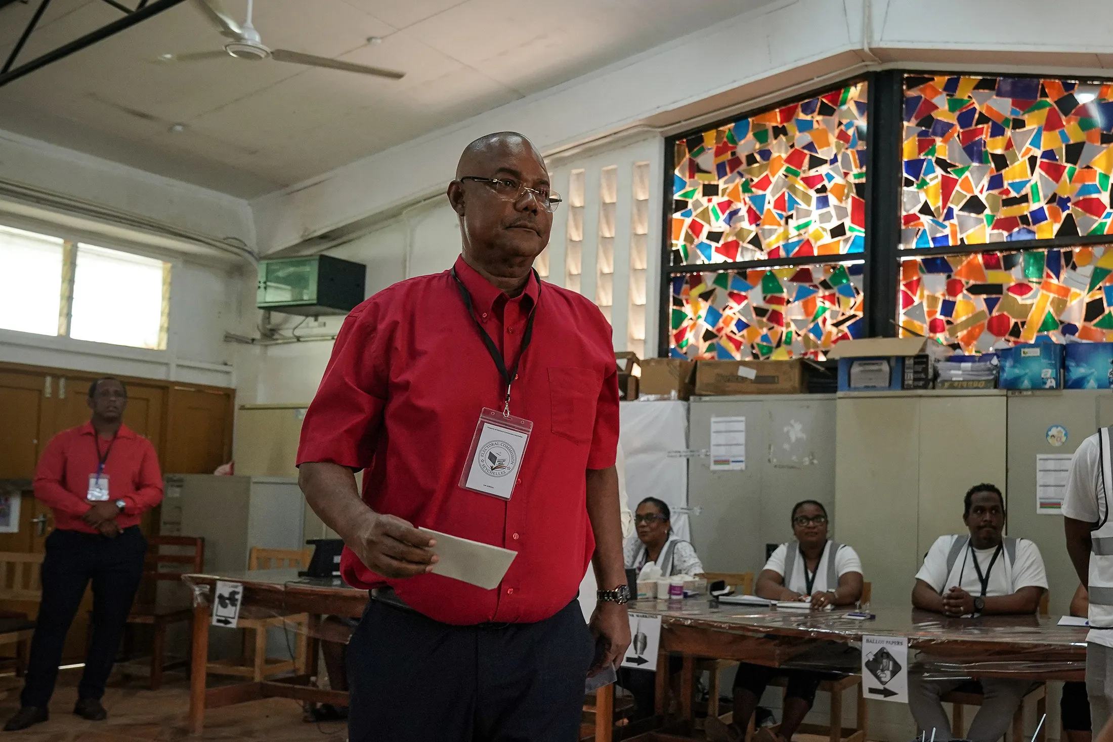 Patrick Herminie casts his vote at a polling station in Victoria, Seychelles, on Sept. 27.