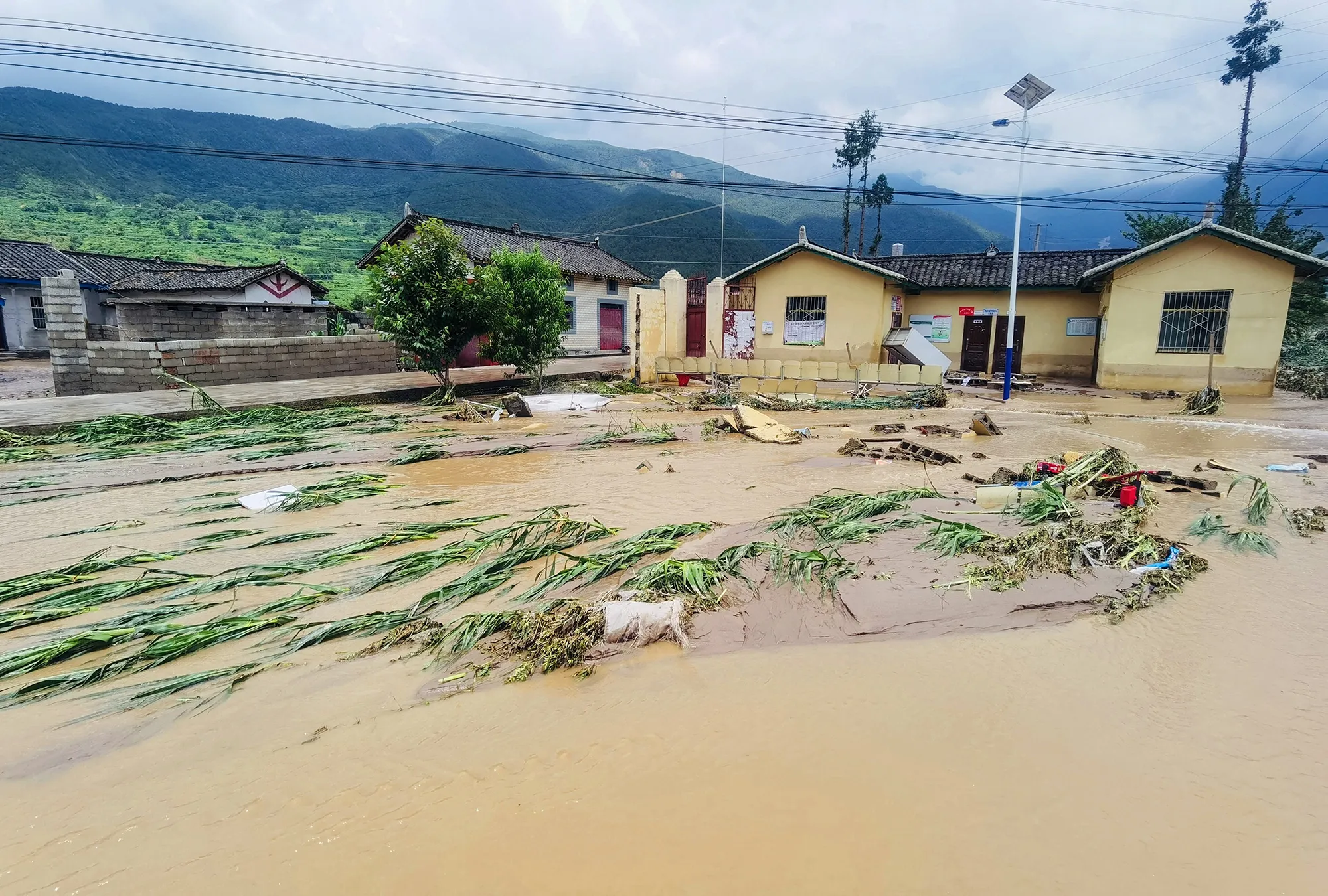 Flood damaged buildings&nbsp;in Mianning county, Sichuan province, China, on June 27.