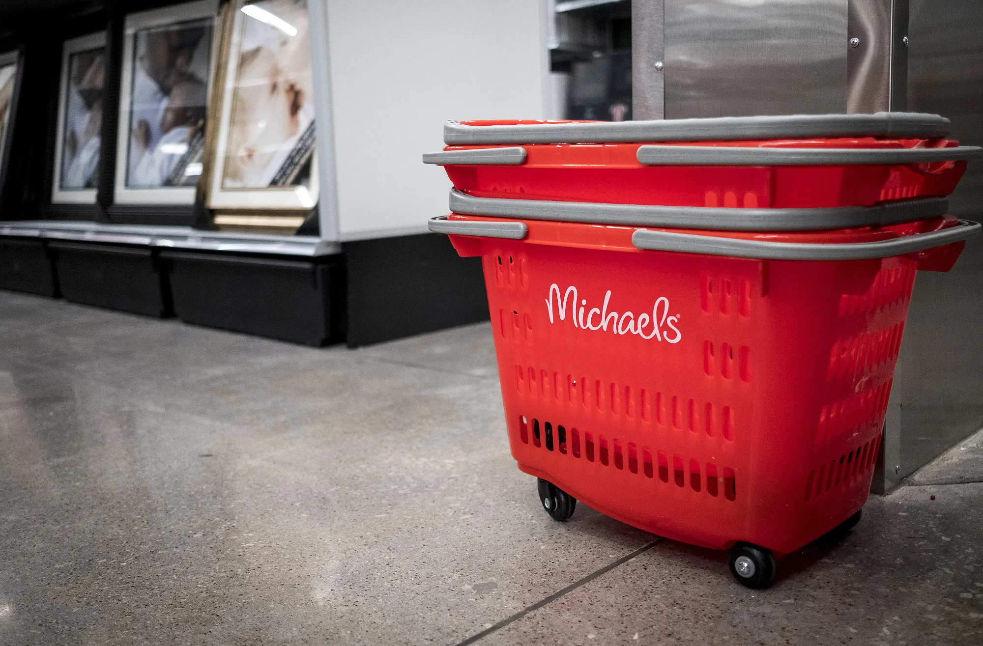 Shopping baskets sit stacked at a Michaels Cos Inc. store in Chicago.