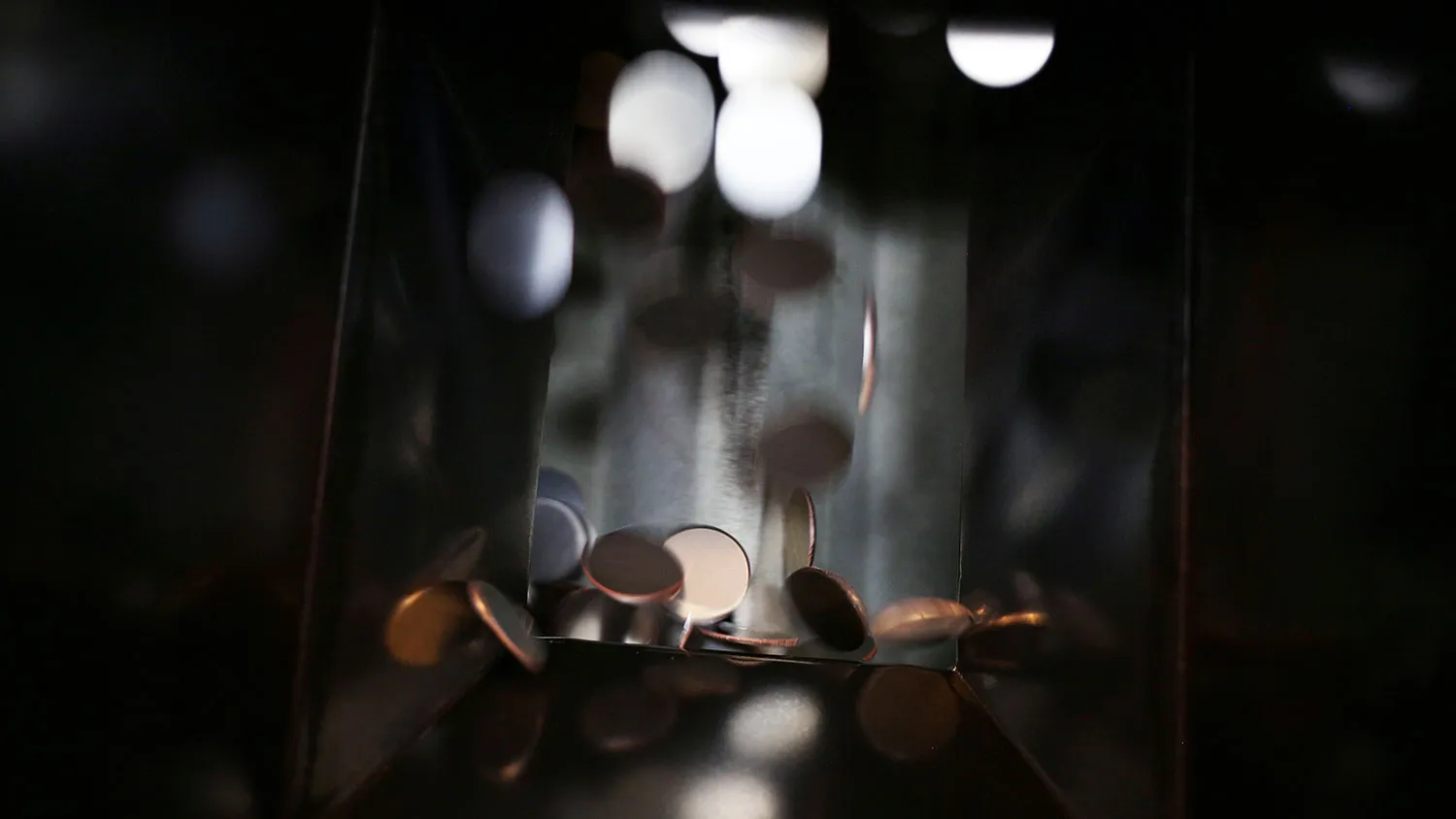 Blank coins move through machinery before being minted at the Denver Mint in Colorado on Oct. 28, 2015.
