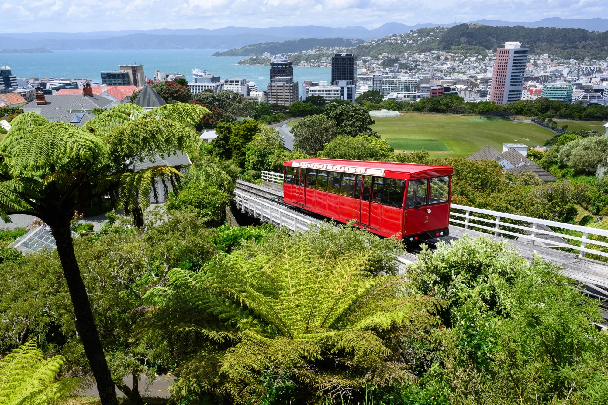 A cable car travels above the central business district in Wellington, New Zealand.