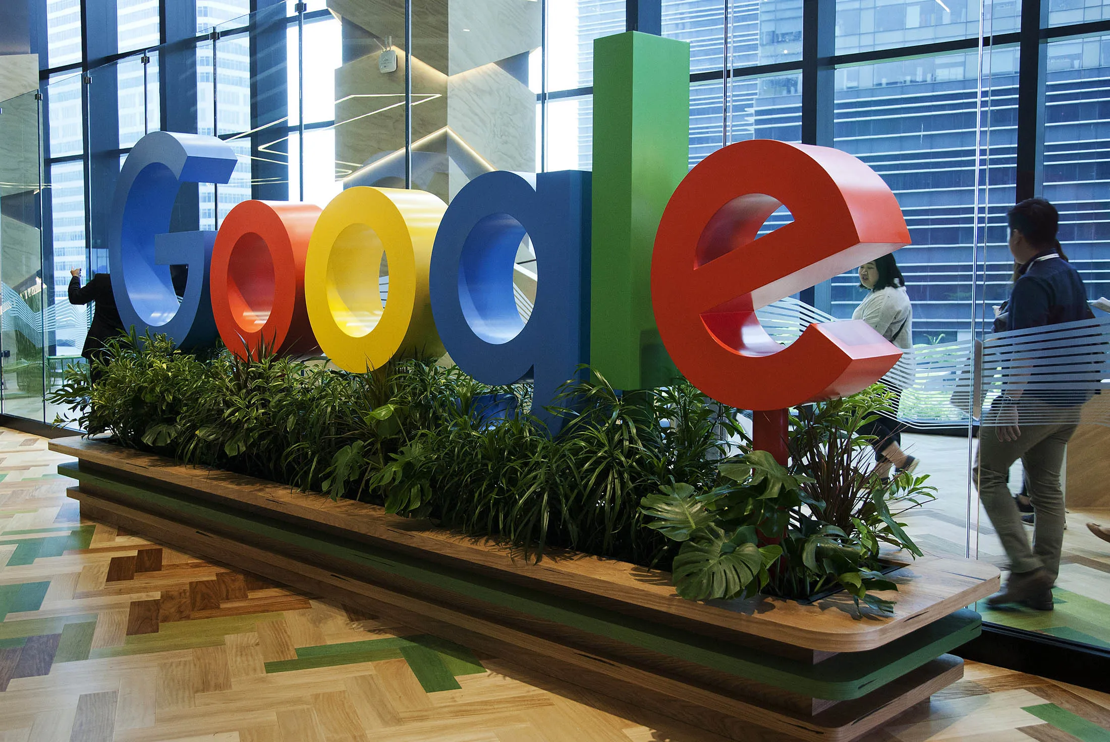 A sign featuring Google Inc.'s logo stands at the company's Asia-Pacific headquarters during its opening day in Singapore, on Thursday, Nov. 10, 2016. Google officially opened its new hub in Singapore today.
